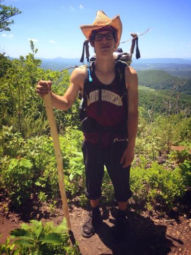 Rockin' the hand-me-down hat and thrift store tank. 